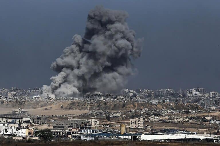 Smoke and dust rising over Gaza following Israeli strikes in the northern Gaza Strip are seen from the Gaza-Israel border region on May 31, 2025.