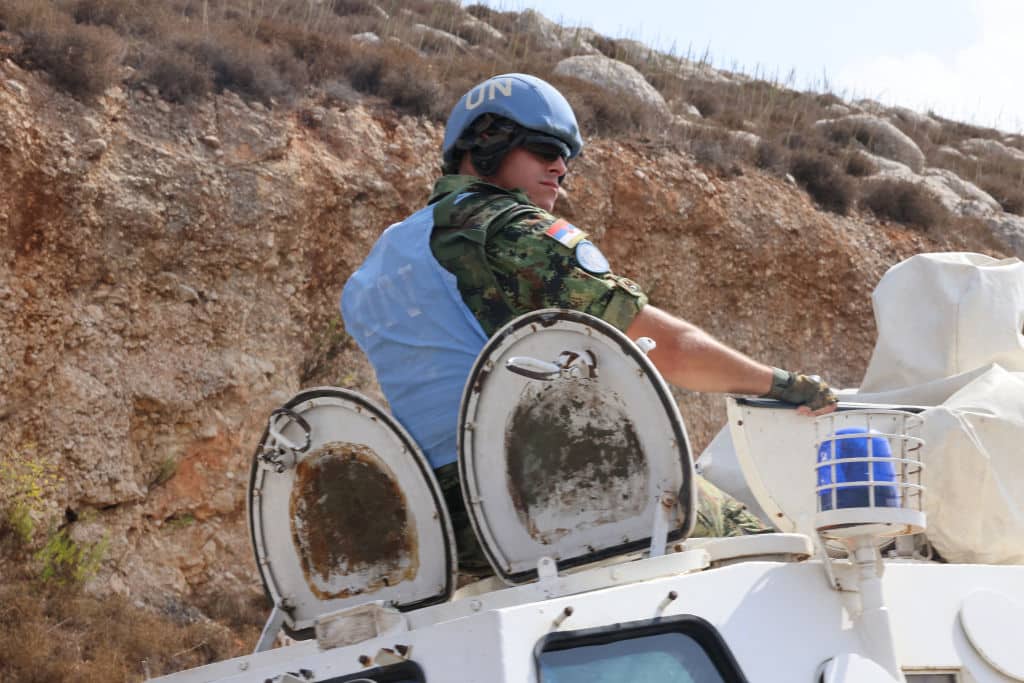 A United Nations Interim Forces in Lebanon (UNIFIL) patrol drives through the southern Lebanese plain of Khiam along the border with Israel on October, 10 2023. Israeli strikes on Lebanon killed three Hezbollah members on October 9, the Iran-backed group said, as tensions surged after Palestinian militants tried to infiltrate into Israel from Lebanon. (Photo by JOSEPH EID / AFP) (Photo by JOSEPH EID/AFP via Getty Images)