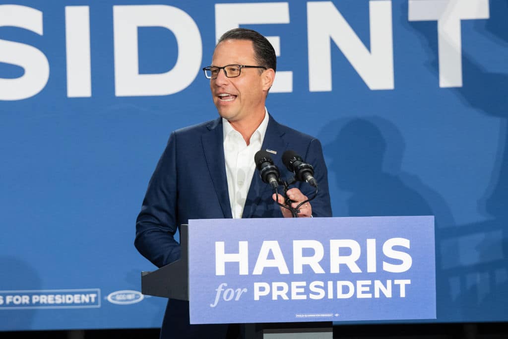 Josh Shapiro, Governor of Pennsylvania speaks during a rally in support of Harris for President along with Gretchen Whitmer, Governor of Michigan Wissahickon High School.