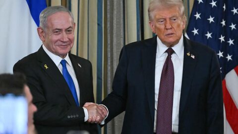 US President Donald Trump and Israeli Prime Minister Benjamin Netanyahu shake hands at the conclusion of a joint press conference in the State Dining Room of the White House in Washington, DC.