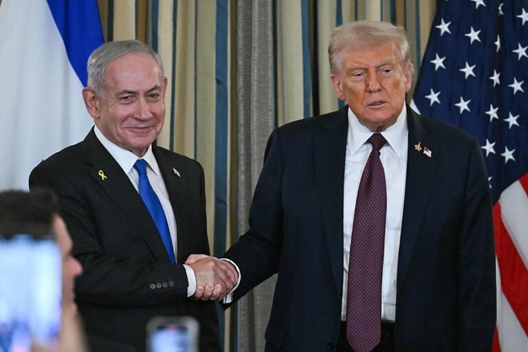 US President Donald Trump and Israeli Prime Minister Benjamin Netanyahu shake hands at the conclusion of a joint press conference in the State Dining Room of the White House in Washington, DC.