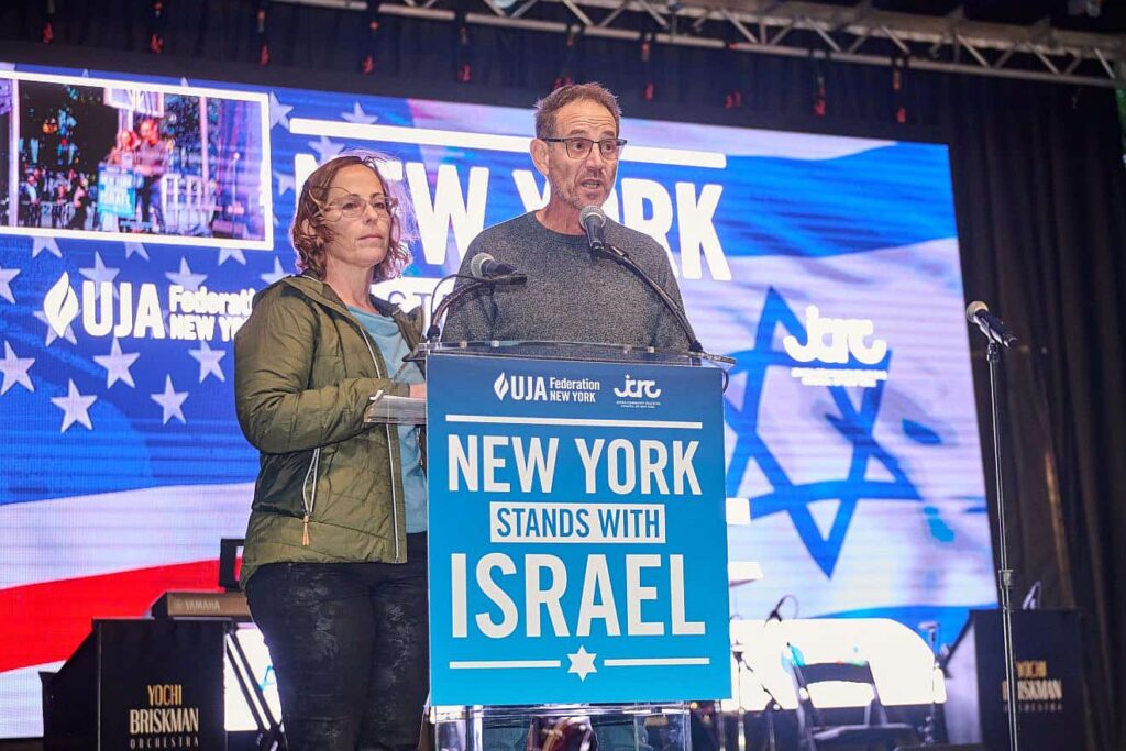 Omer and Orna Neutra speak about their son, Omer at a Manhattan rally in October, 2023.