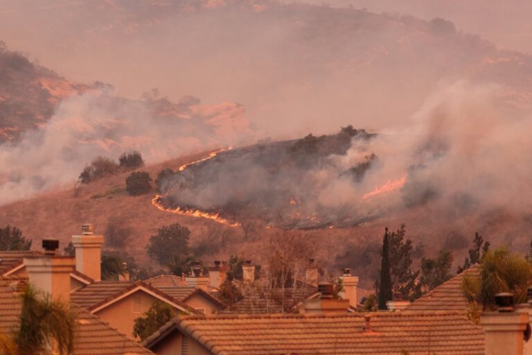 A view of the spreading flames from a wildfire in California. Photo by Aarti Kalyani via Shutterstock