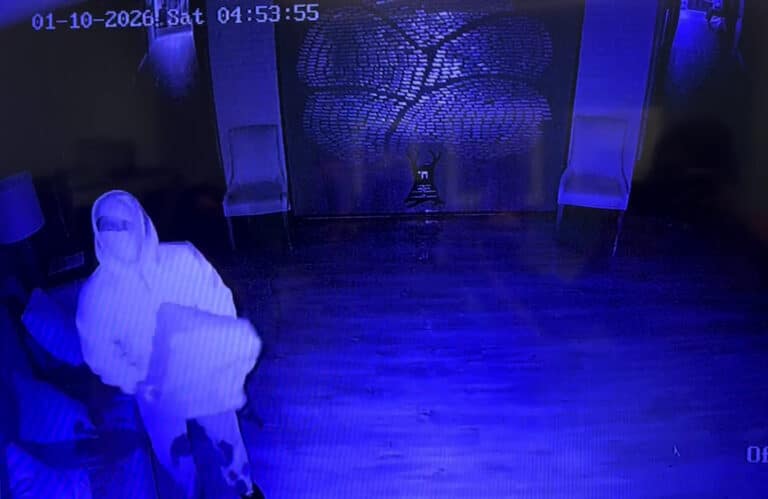 A security camera inside Beth Israel Congregation synagogue in Jackson caught a person splashing allegedly gasoline before a fire ignited, Jan. 10, 2026. (Beth Israel Congregation)
