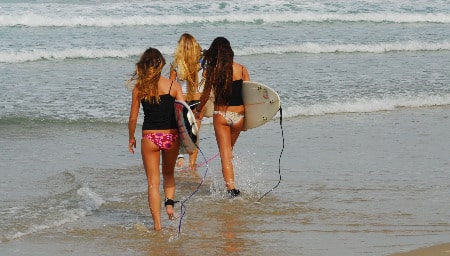 Photo by Gili Yaari/Flash 90. Girls take to the surf.